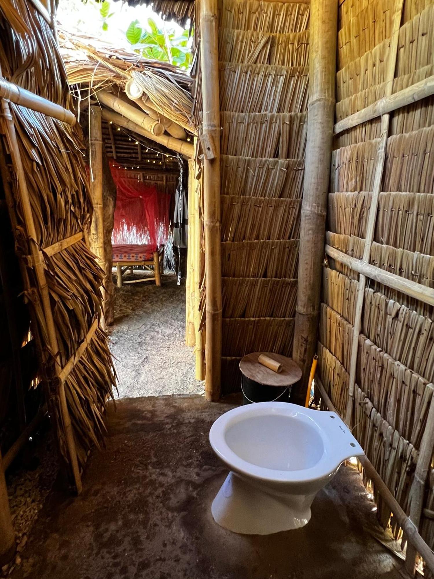 Hostel Tribal Huts Community Daanbantayan Zimmer foto